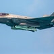 A U.S. Air Force F-35A flying with weapons bay doors open over Miami Beach, Florida.